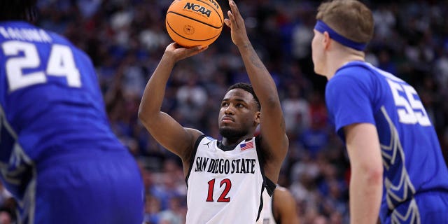 Mar 26, 2023; Louisville, KY, USA; San Diego State Aztecs guard Darrion Trammell (12) makes a free throw during the second half against the Creighton Bluejays at the NCAA Tournament South Regional-Creighton vs San Diego State at KFC YUM! Center.