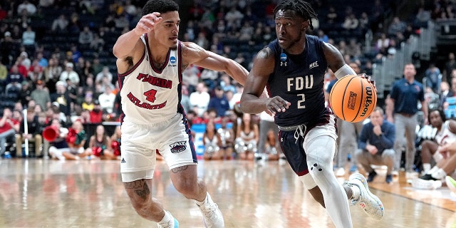 Demetre Roberts #2 of the Fairleigh Dickinson Knights drives to the basket against Bryan Greenlee #4 of the Florida Atlantic Owls during the second half in the second round game of the NCAA Men's Basketball Tournament at Nationwide Arena on March 19, 2023 in Columbus, Ohio.