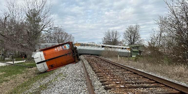 According to Kentucky State Police, the CSX train derailed around 3 p.m. after attempting to avoid a semi truck that was on the tracks.