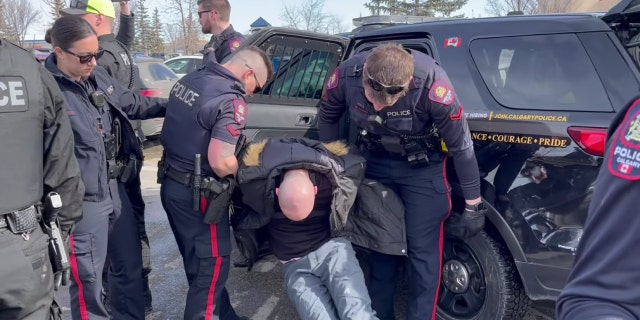 Pastor Derek Reimer, 36, was arrested and charged last week with one count of breaching a release order that prohibited him from communicating with LGBTQ people or being within 200 meters of events involving the LGBTQ community.