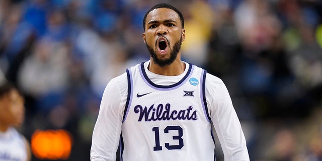 Desi Sills #13 of the Kansas State Wildcats reacts during the second half of the Kentucky Wildcats in the second round of the NCAA Men's Basketball Tournament at The Fieldhouse at Greensboro Coliseum on March 19, 2023 in Greensboro, North Carolina.