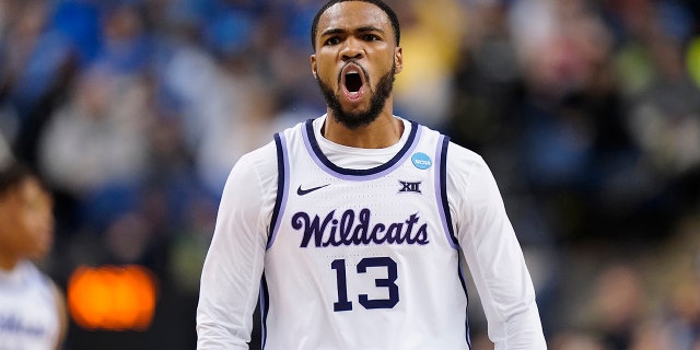 Desi Sills #13 of the Kansas State Wildcats reacts during the second half of the Kentucky Wildcats in the second round of the NCAA Men's Basketball Tournament at The Fieldhouse at Greensboro Coliseum on March 19, 2023 in Greensboro, North Carolina.