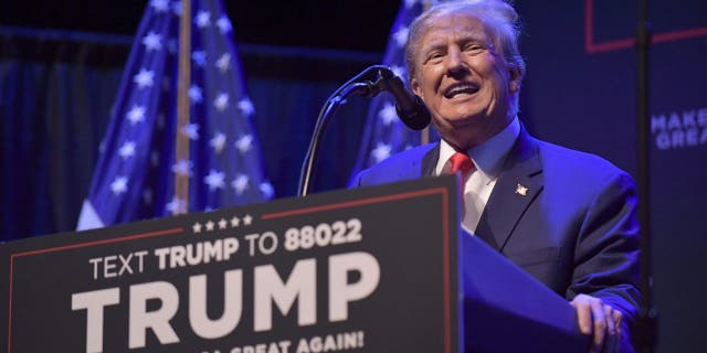 Former President Trump speaks at a campaign event March 13, 2023, in Davenport, Iowa. 