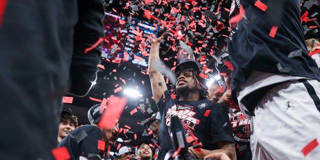 The San Diego State Aztecs celebrate defeating the Creighton Bluejays during the Elite Eight of the 2023 NCAA Tournament at KFC YUM! Center March 26, 2023, in Louisville, Ky.