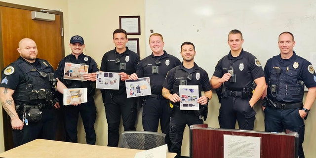Officer Rex Engelbert, third from left, was among a group of officers recognized recently with a "Central Precinct Commander’s Coin for their hard work and dedication to precision policing."
