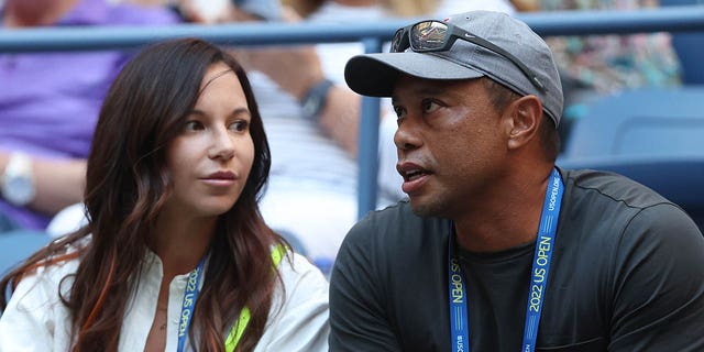 Erica Herman and Tiger Woods look on before the women's singles second round match between Anett Kontaveit and Serena Williams on day three of the 2022 US Open at the USTA Billie Jean King National Tennis Center on August 31, 2022 in the Flushing neighborhood of Queens borough of New York City.