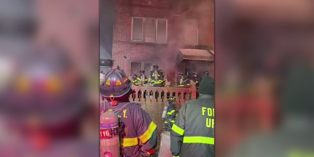 Dozens of firefighters responded to the five-alarm fire in the Woodside neighborhood Tuesday night.
