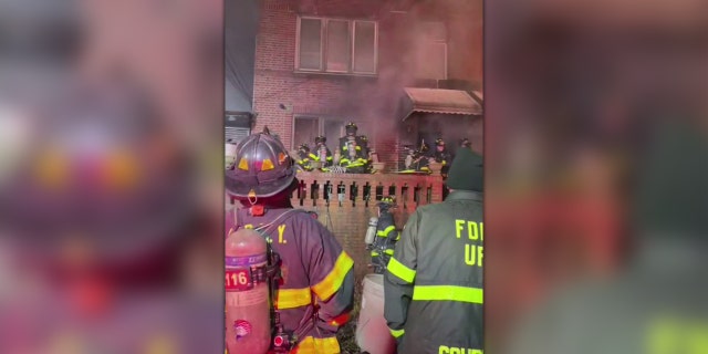 Dozens of firefighters responded to the five-alarm fire in the Woodside neighborhood Tuesday night.