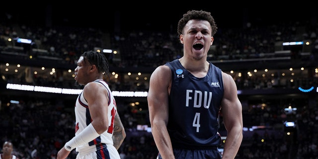 Grant Singleton #4 of the Fairleigh Dickinson Knights celebrates a basket against the Florida Atlantic Owls during the second half of a second round game of the NCAA Men's Basketball Tournament at Nationwide Arena on March 19, 2023 in Columbus, Ohio.