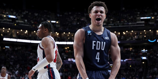 Grant Singleton #4 of the Fairleigh Dickinson Knights celebrates a basket against the Florida Atlantic Owls during the second half in the second round game of the NCAA Men's Basketball Tournament at Nationwide Arena on March 19, 2023 in Columbus, Ohio.