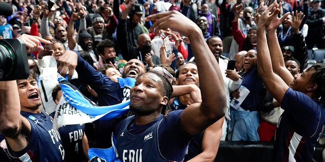 Fairleigh Dickinson players celebrate beating Purdue 63-58 after a first-round college basketball game in the NCAA Tournament on Friday, March 17, 2023, in Columbus, Ohio.