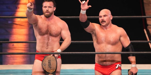 Cash Wheeler and Dax Harwood celebrate their victory during the New Japan Pro-Wrestling at Edion Arena Osaka on November 05, 2022 in Osaka, Japan.