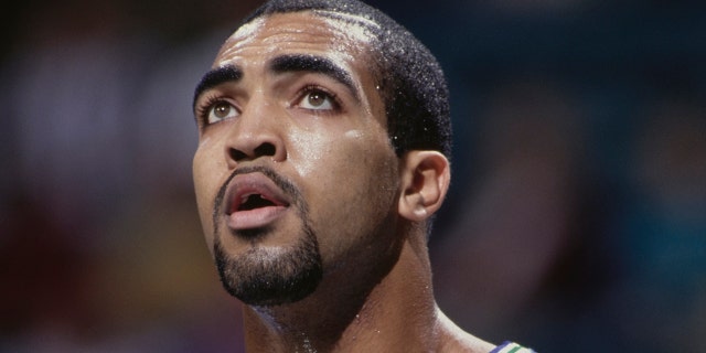 Felton Spencer, #50 for the Minnesota Timberwolves, looks on during the NBA Central Division basketball game against the Charlotte Hornets on March 10, 1992 at the Charlotte Coliseum in Charlotte, North Carolina. The Hornets won the game 105 - 96.