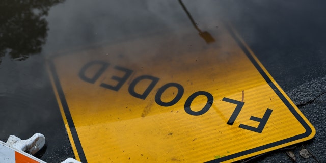 A view of a flooded street in Menlo Park as rainstorm hits San Francisco and the Bay Area, California, on Feb. 27, 2023.