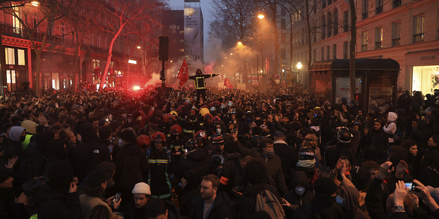 Protesters march during a rally in Paris.