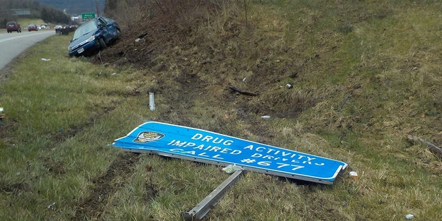 An impaired driver hit a sign that included the information on how to report impaired drivers, OSHP said on social media.