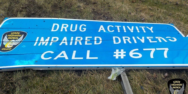 A sign with information on how to report drunk drivers was knocked over by an impaired driver, OSHP said.