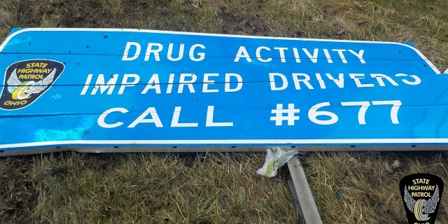 A sign with information on how to report drunk drivers was knocked over by an impaired driver, OSHP said.
