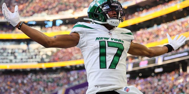 Garrett Wilson, #17 of the New York Jets, celebrates after a long gain during the fourth quarter against the Minnesota Vikings at U.S. Bank Stadium on Dec. 4, 2022 in Minneapolis.