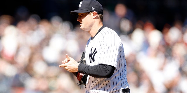 Gerrit Cole #45 of the New York Yankees throws during the fifth inning against the San Francisco Giants on opening day at Yankee Stadium on March 30, 2023 in the New York City borough of the Bronx.