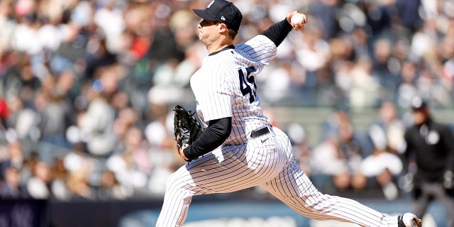 Gerrit Cole #45 of the New York Yankees pitches during the fifth inning against the San Francisco Giants on Opening Day at Yankee Stadium on March 30, 2023 in the Bronx borough of New York City.