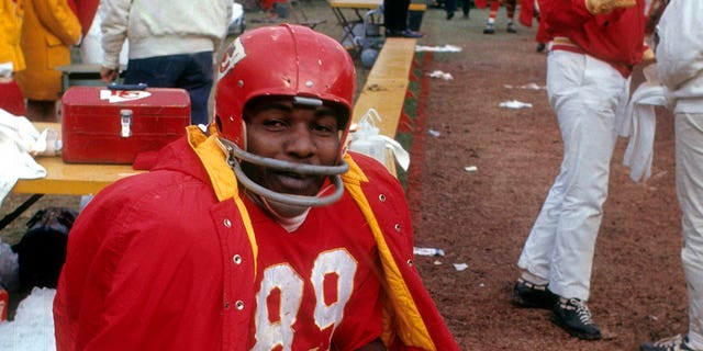 Wide receiver Otis Taylor, #89 for the Kansas City Chiefs, sitting on the bench in the early 1970s during an NFL football game at Municipal Stadium in Kansas City, Missouri.  Taylor played for the Chiefs from 1965 to 1975. 