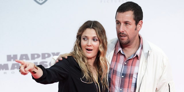 Drew Barrimore and Adam Sandler arrive for the world premiere of the movie 'Blended' at Cinestar in Berlin, Germany, 19 May 2014. 