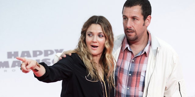 Drew Barrimore and Adam Sandler arrive for the world premiere of the movie 'Blended' at Cinestar in Berlin, Germany, 19 May 2014. 