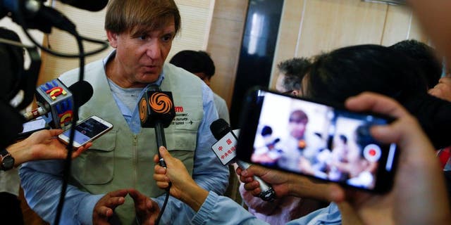 Blaine Gibson, the self-styled wreck hunter searching for missing Malaysian Airlines flight MH370 talks to media members after handing over pieces of debris found in Madagascar believed to be from flight MH370 to Malaysia's Transport Minister Anthony Loke in Putrajaya Nov. 30, 2018.