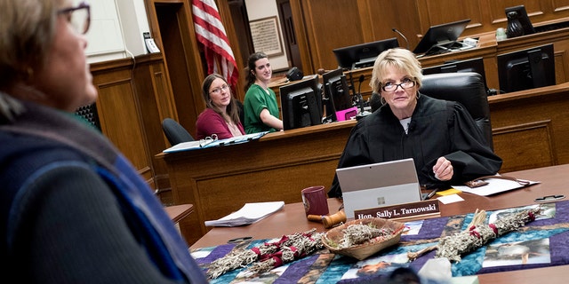 Judge Sally Tarnowski, seen presiding during an Indian Child Welfare Act case hearing in 2019, reportedly died Monday while vacationing in Florida. 