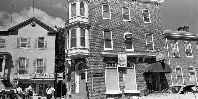 View of a building that houses the Mother Seton Guild hall (4 East Main Street) and the Knights of Columbus Brute Council No. 1860 (9 East Main St.) in Emmitsburg, Maryland. The photo was taken on the day that Elizabeth Ann Seton (1774-1821), who founded the Sisters of Charity of St Joseph's, was canonized by Pope Paul VI in Rome. She became the first native-born American Roman Catholic Saint. 