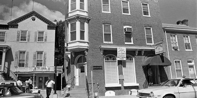 View of a building that houses the Mother Seton Guild hall (4 East Main Street) and the Knights of Columbus Brute Council No. 1860 (9 East Main St.) in Emmitsburg, Maryland. The photo was taken on the day that Elizabeth Ann Seton (1774-1821), who founded the Sisters of Charity of St Joseph's, was canonized by Pope Paul VI in Rome. She became the first native-born American Roman Catholic Saint.