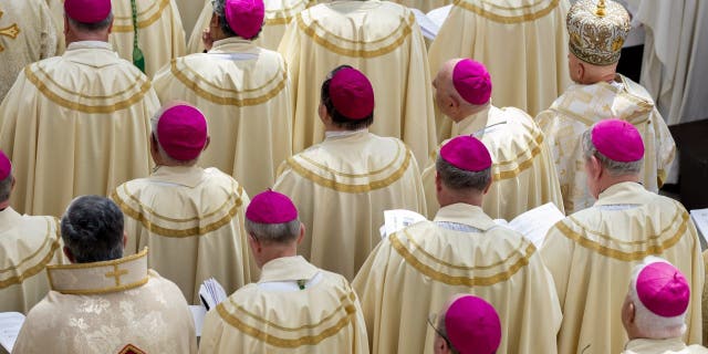 Bishops listen during the Christ Cathedral Solemn Mass of Dedication in Garden Grove, CA.