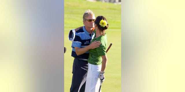 Michael Douglas and Catherine Zeta Jones during All Star Golf Cup - Day 1 - in 2005.