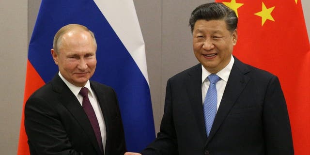 Left-wing Russian President Vladimir Putin signed an economic deal with Chinese President Xi Jinping at a bilateral meeting in Moscow on Tuesday.