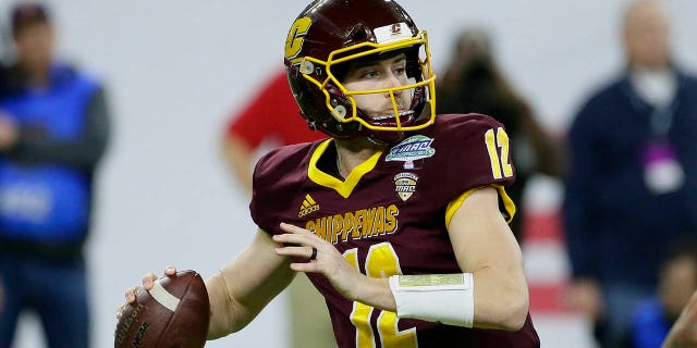 Quarterback Quinten Dormady of the Central Michigan Chippewas looks to pass against the Miami (Ohio) Redhawks during the first half of the MAC Championship at Ford Field Dec. 7, 2019, in Detroit.
