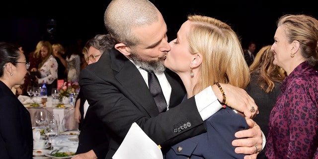 Jim Toth and Reese Witherspoon in 2019.