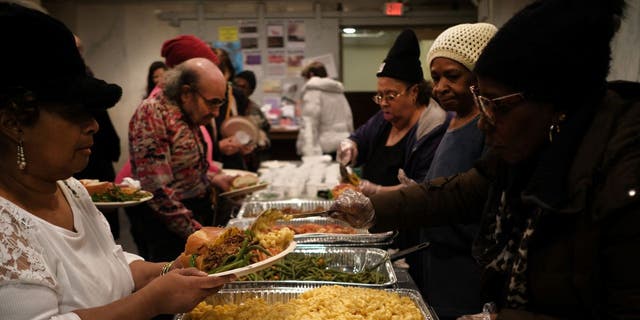  New Yorkers, many of them homeless or formally homeless, attend a service and dinner at Judson Memorial Church on National Homeless Persons' Memorial Day on December 21, 2019 in New York City.