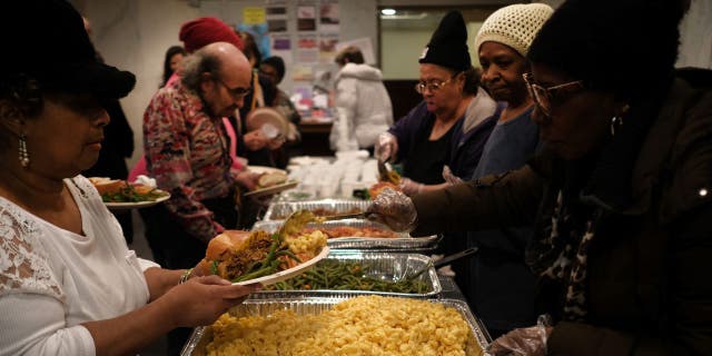  New Yorkers, many of them homeless or formally homeless, attend a service and dinner at Judson Memorial Church on National Homeless Persons' Memorial Day on December 21, 2019 in New York City.