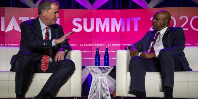 Doug Parker, chairman and chief executive officer of American Airlines Group Inc., left, speaks to Rick Wade, vice president of strategic alliances and outreach at the U.S. Chamber of Commerce, at the U.S. Chamber of Commerce Aviation Summit in Washington, D.C., U.S., on Thursday, March 5, 2020. Photographer: Zach Gibson/Bloomberg via Getty Images