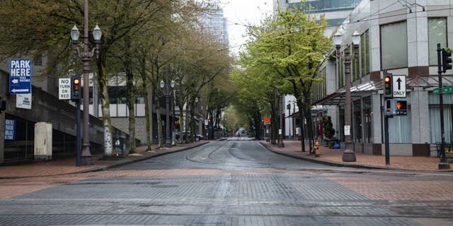 Empty streets are seen in downtown Portland, Oregon, Wednesday, April 22, 2020. 