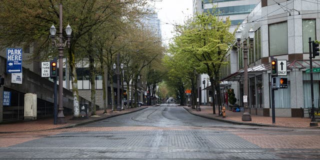 Empty streets are seen in downtown Portland, Oregon, Wednesday, April 22, 2020.