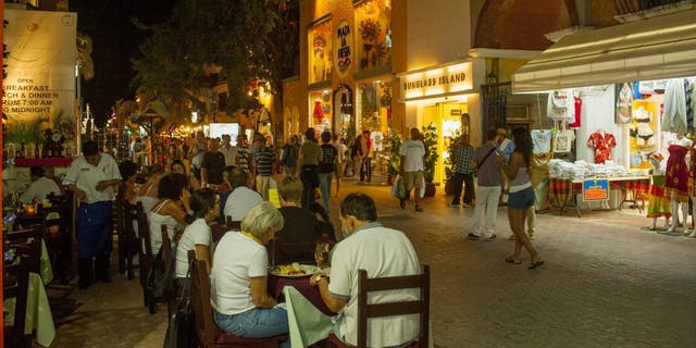 Street scene of 5th Avenue at night in Playa del Carmen on the Riviera Maya near Cancun in the state of Quintana Roo, Mexico.