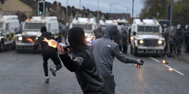 Nationalists attack police on Springfield Road just up from Peace Wall interface gates which divide the nationalist and loyalist communities in Belfast, Northern Ireland, on April 8, 2021.