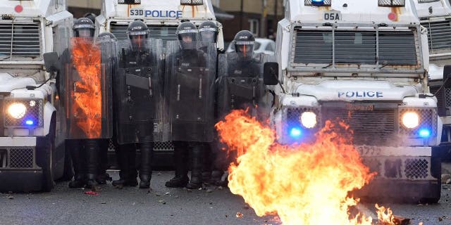 Nationalists onslaught constabulary connected Springfield Road conscionable up from Peace Wall interface gates which disagreement the nationalist and loyalist communities successful Belfast, Northern Ireland, connected April 8, 2021.