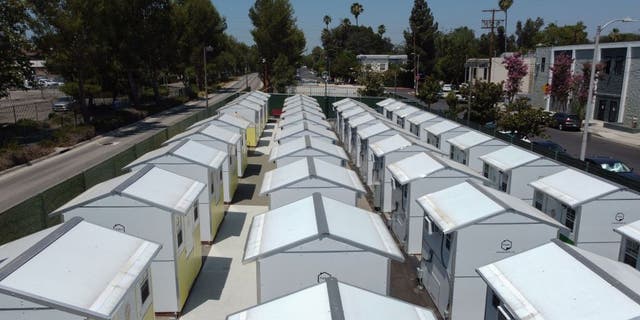 A view of housing units at the Tarzana Tiny Home Village, which offers temporary housing for homeless people, is seen on July 9, 2021 in the Tarzana neighborhood of Los Angeles.