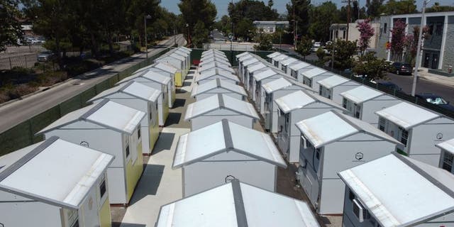 A view of housing units at the Tarzana Tiny Home Village, which offers temporary housing for homeless people, is seen on July 9, 2021 in the Tarzana neighborhood of Los Angeles.