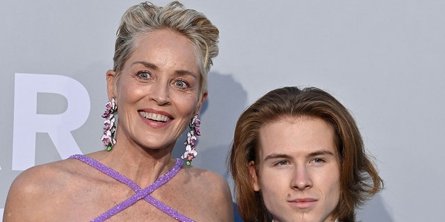 Sharon Stone was accompanied by her son Roan, right, to the 2021 Cannes Film Festival.