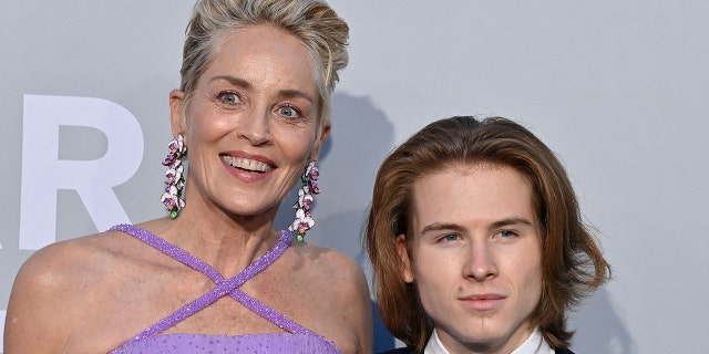 Sharon Stone was accompanied by her son Roan, right, to the 2021 Cannes Film Festival.