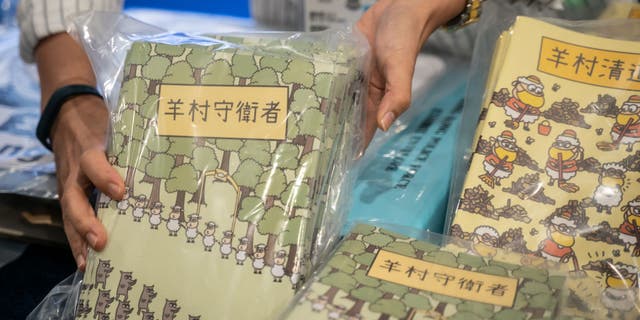 Children's books are pictured during a press conference after five people were arrested under suspicion of conspiring to publish seditious material at the Hong Kong Police Headquarters on July 22, 2021, in Hong Kong, China.